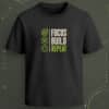 Black regular-fit T-shirt with “Focus Build Repeat” cream and green motivational graphic with goal, build, and repeat icons.