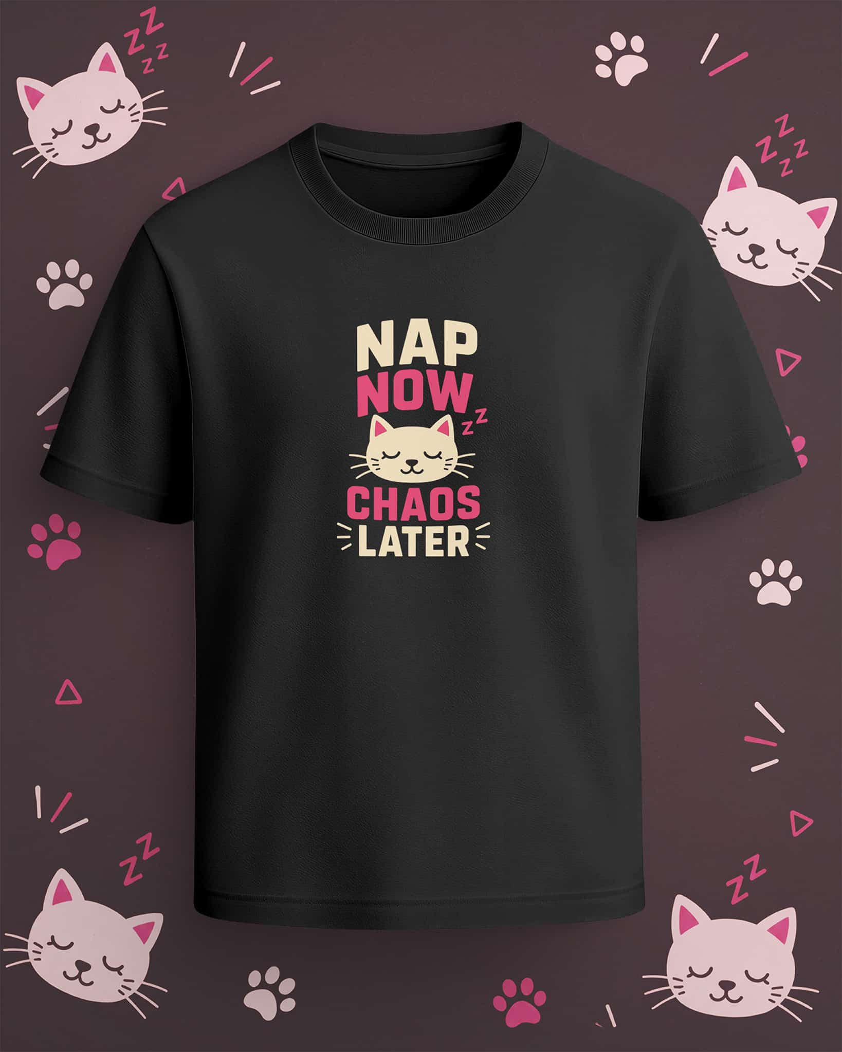 Black regular-fit T-shirt with “Nap Now Chaos Later” cream and pink cat graphic featuring a sleeping cat illustration.